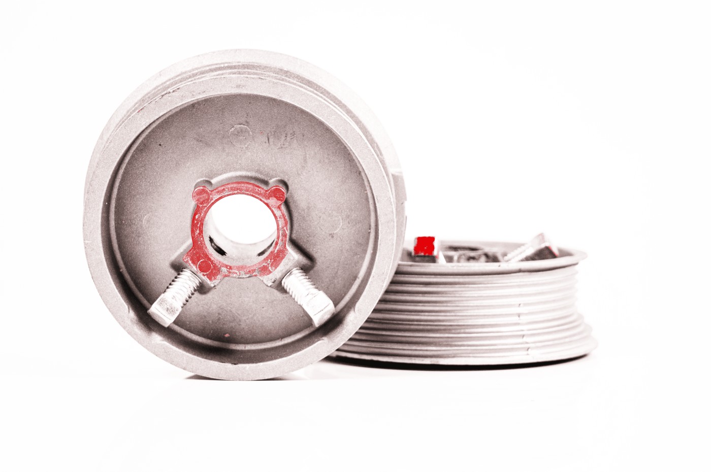 Grooved garage door cable drums shown as separate components