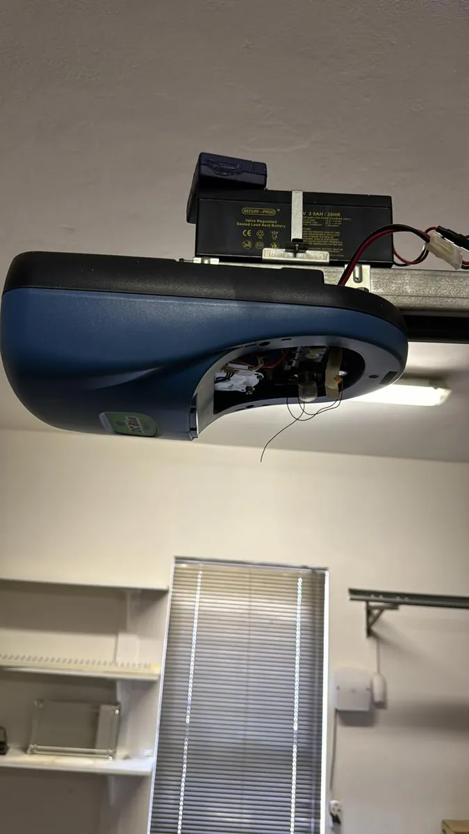 Blue garage door motor side profile