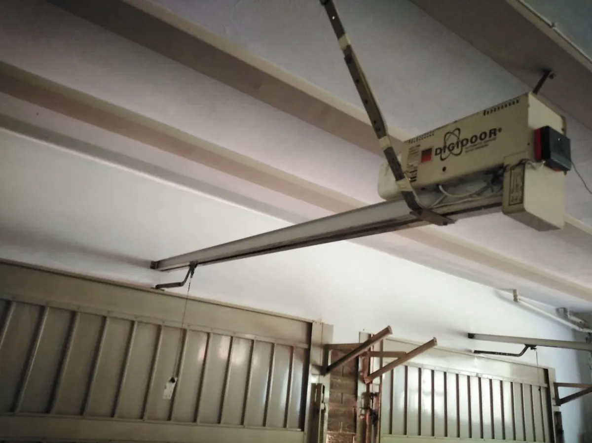 Garage door servicing reference for Randfontein: garage door motor and guide rail