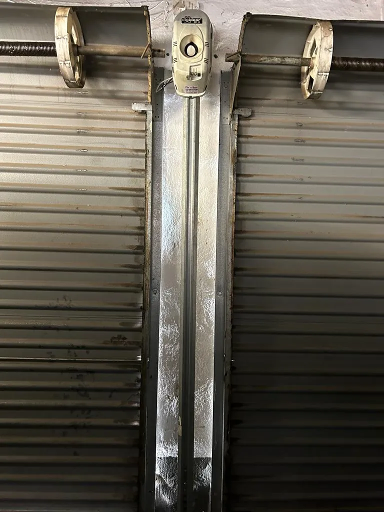Roll up garage door centre rail and pulleys